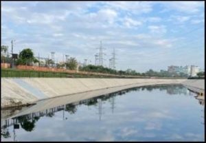 The plant discharging treated water into the Dravyavati River